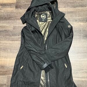 MK rain coat size M